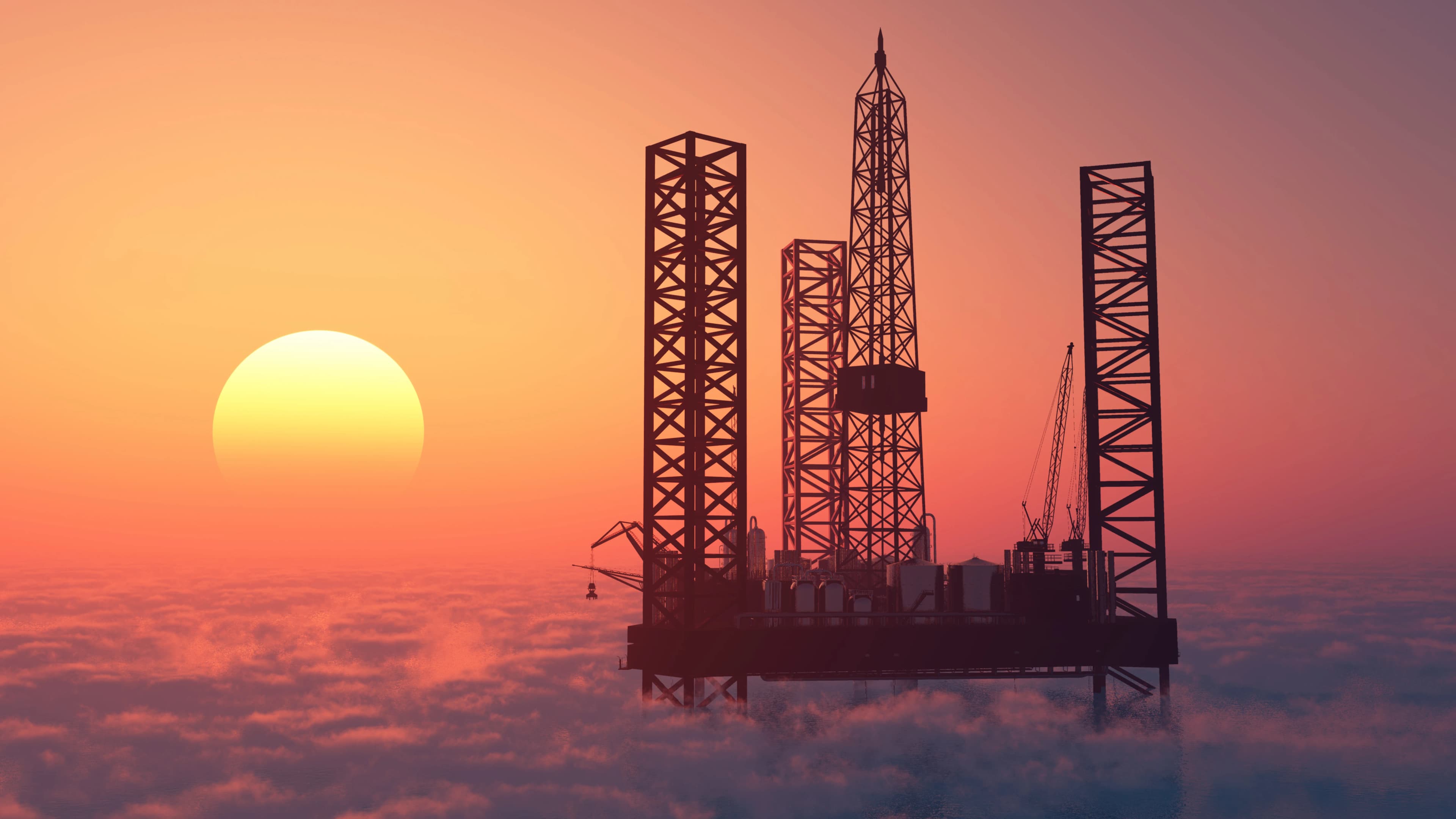 Нафтова платформа на заході сонця